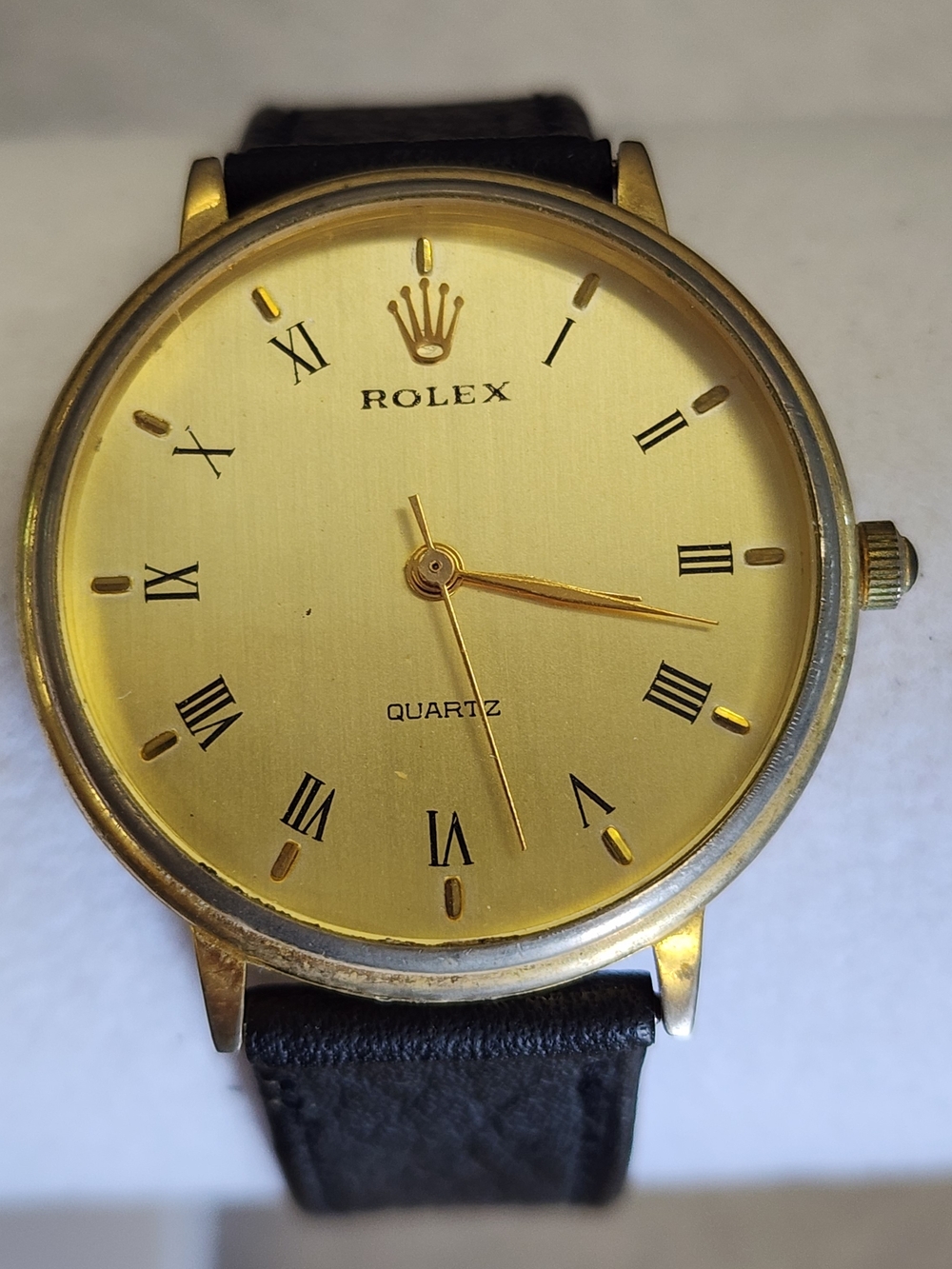 Vintage Gold Tone Mens Watch Roman Numeral Dial Black Strap Minimalist